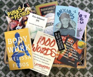 A pile of books and zines that tell personal stories, available at Quimby’s Bookstore in Chicago.